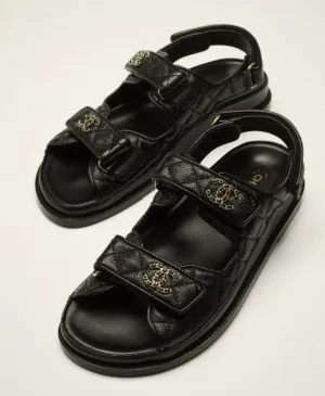 CHANEL SHINY LAMBSKIN QUILTED LEATHER SANDALS IN BLACK, 36.5
