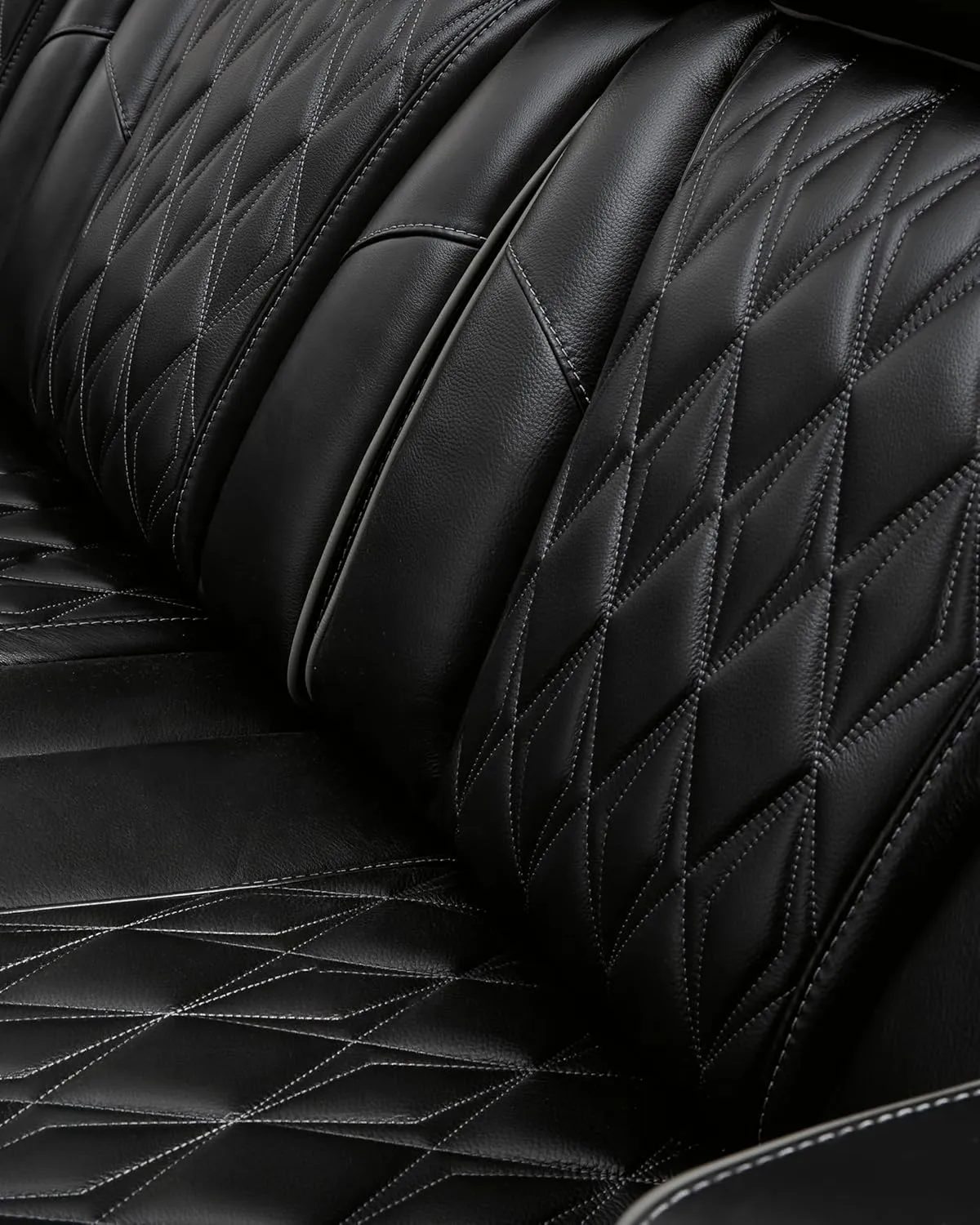 Signature Design by Ashley Boyington Modern Leather Match Power Reclining Loveseat with Console, Adjustable Headrest, Massage, Heated Seat and LED Lights, Black