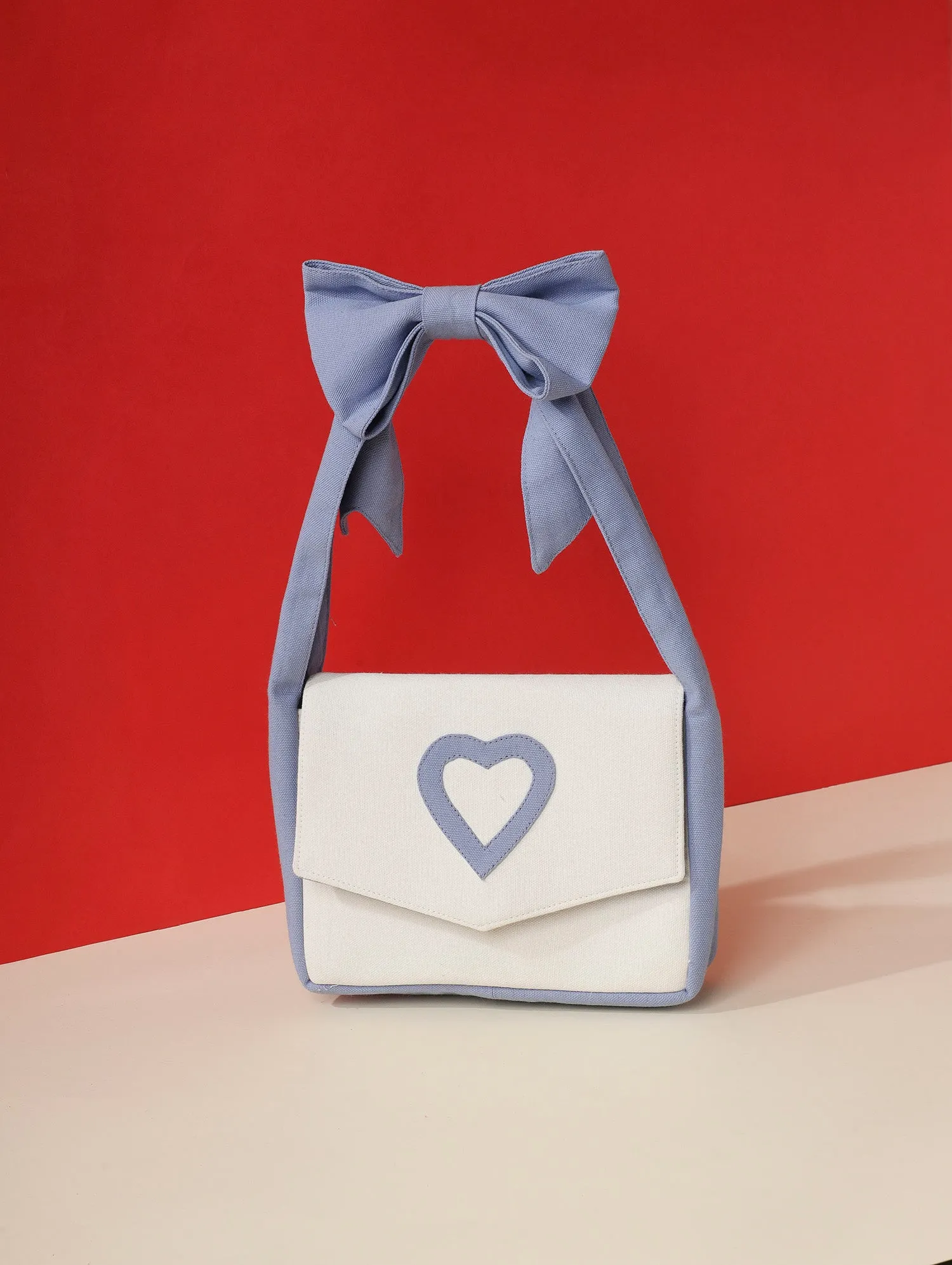 VALENTINE CLUTCH AZURE BLUE